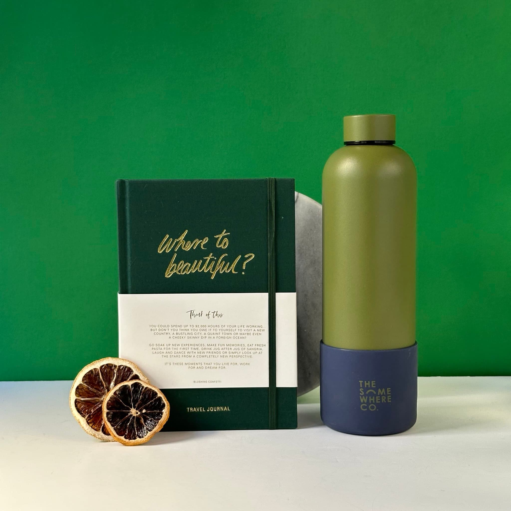 The Traveller's Journal gift set with a khaki water bottle, travel journal, and personalised card in a premium black box.